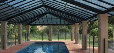 Springfield Home – for Scott Salisbury Homes pool enclosure using Makrolon’s 6mm grey solid polycarbonate roofing.